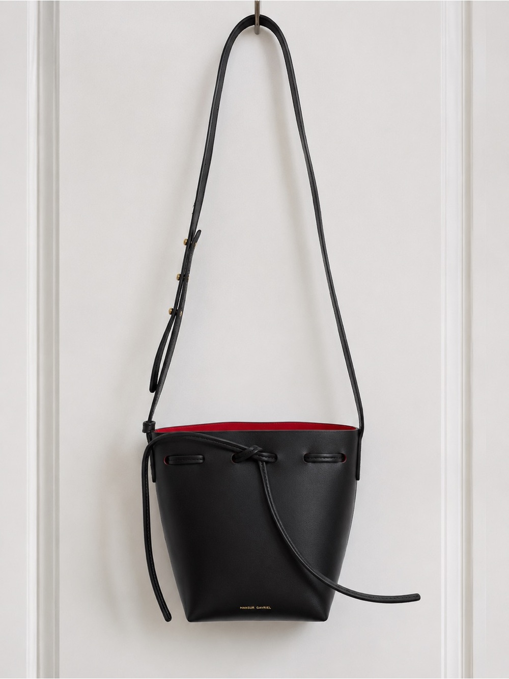 Black Leather Crossbody Bucket Bag with Red Interior